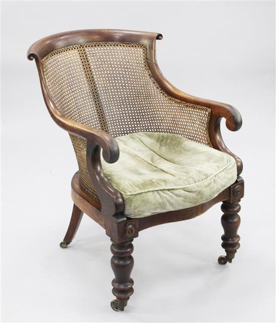 A William IV mahogany tub shape bergere armchair,